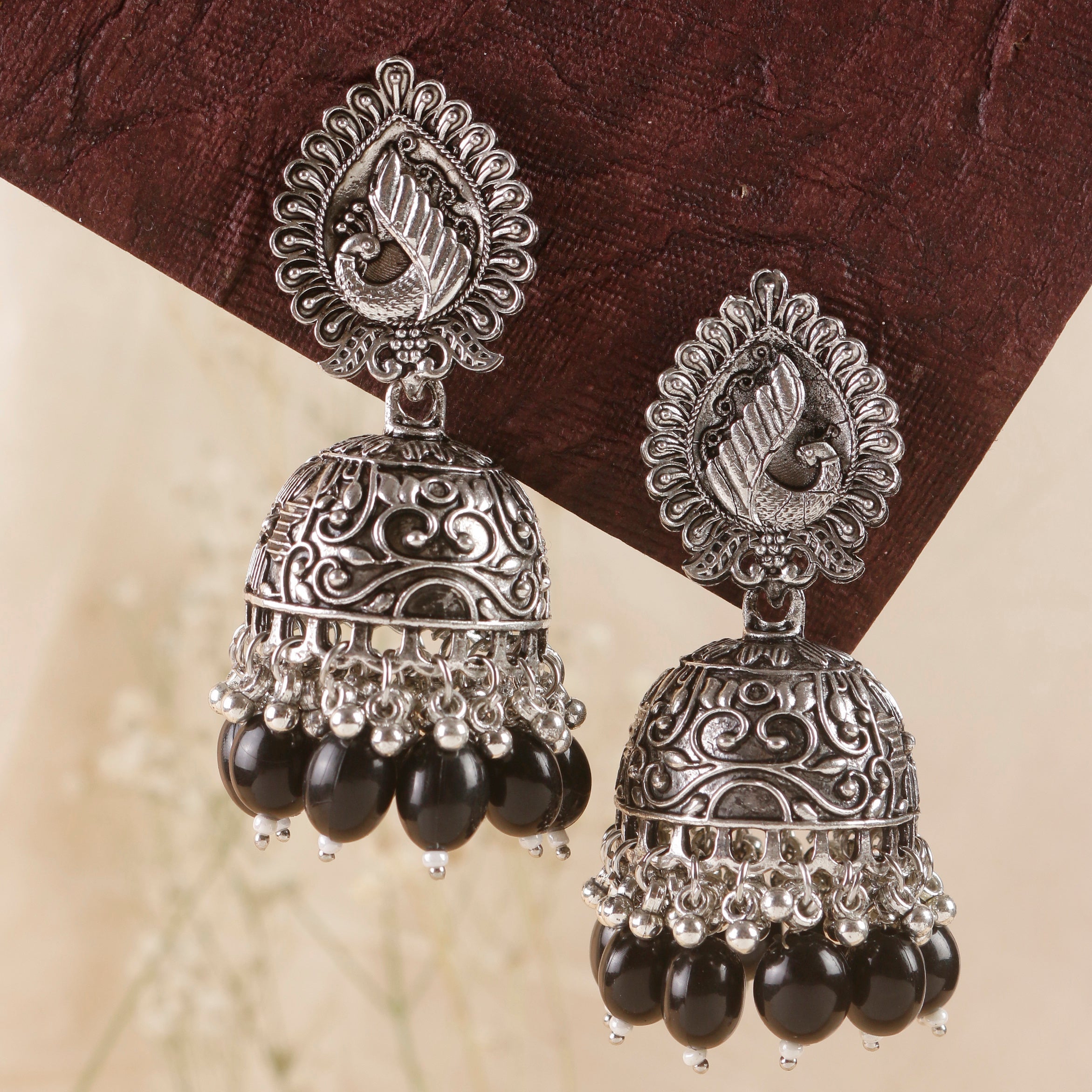Swisni Alloy Silver Jhumki Earrings with Black Beads