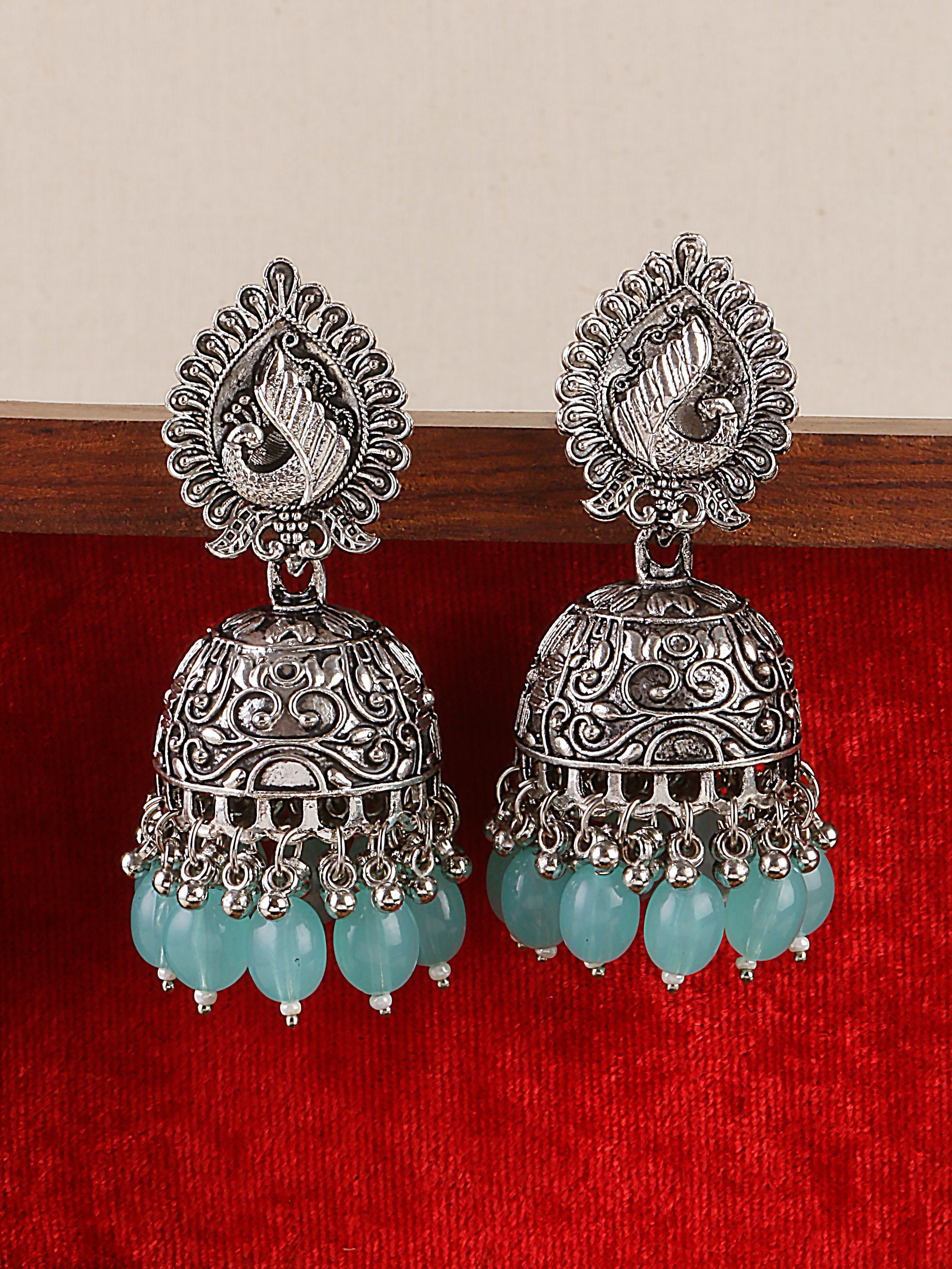 Swisni Alloy Silver Jhumki Earrings with Sky Blue Beads