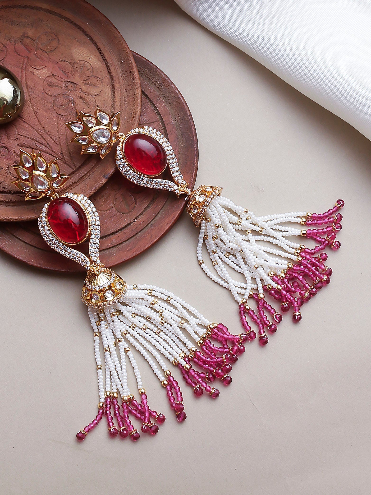 Swisni Alloy Golden Jhumki Earrings with White N Pink