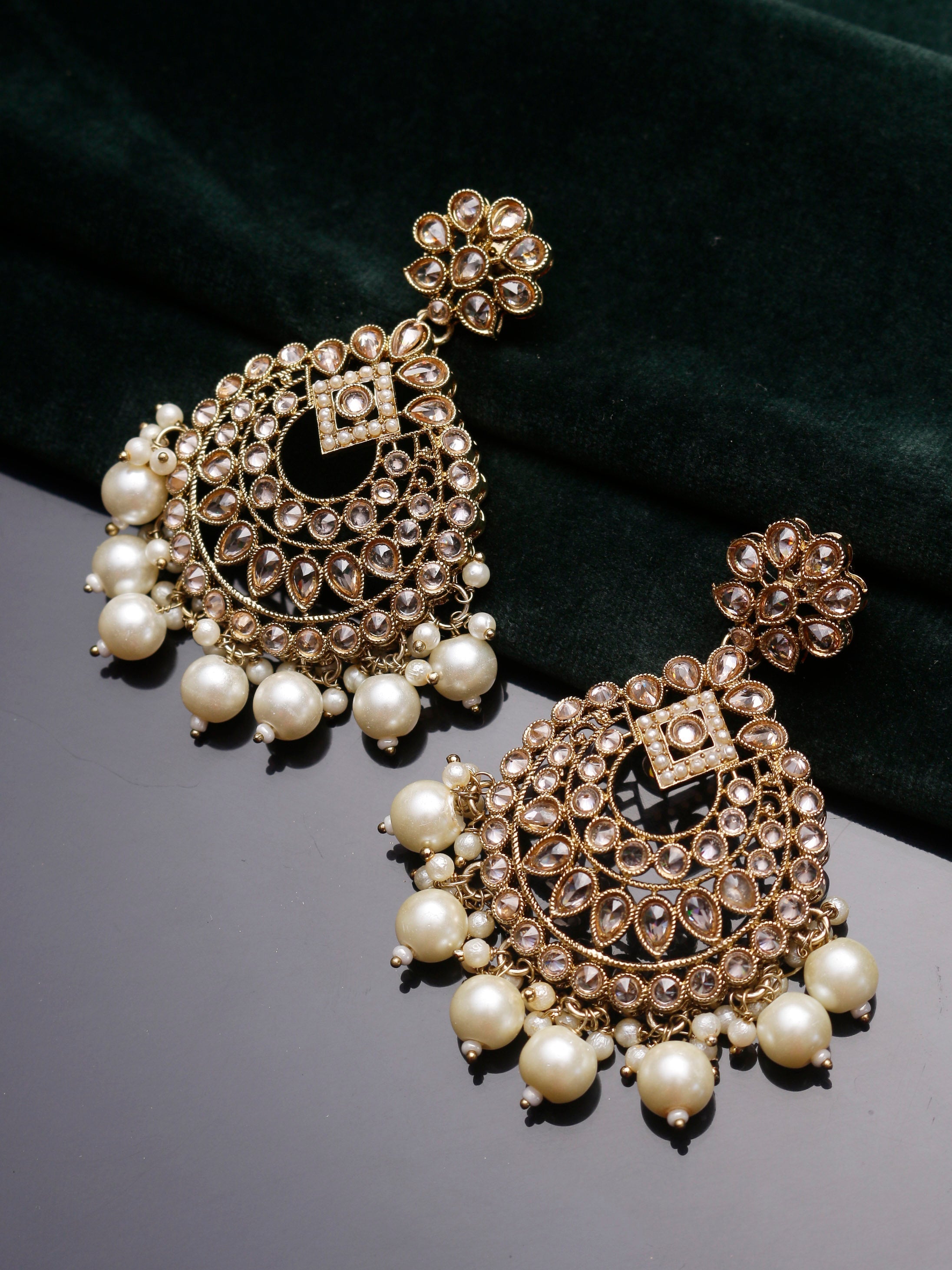 Swisni Alloy Golden Jhumki Earrings with White Beads