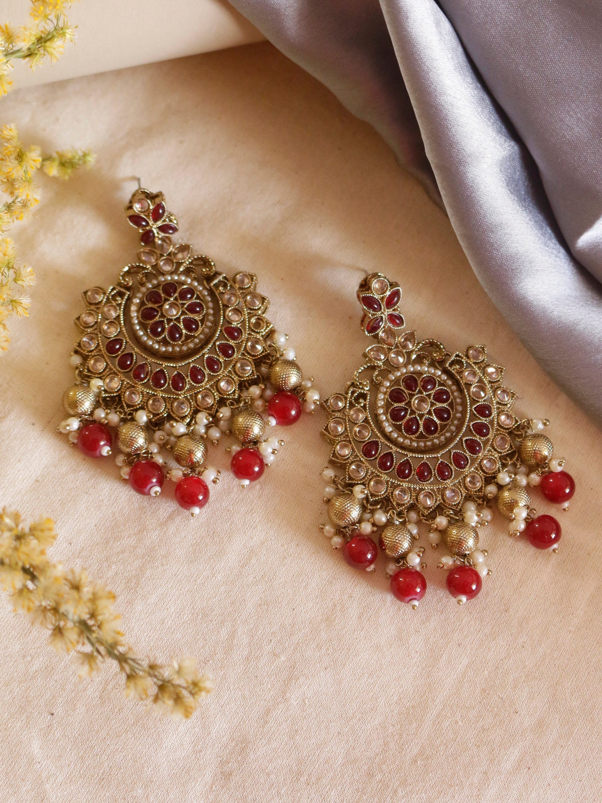 Swisni Alloy Golden Earrings with Red Beads