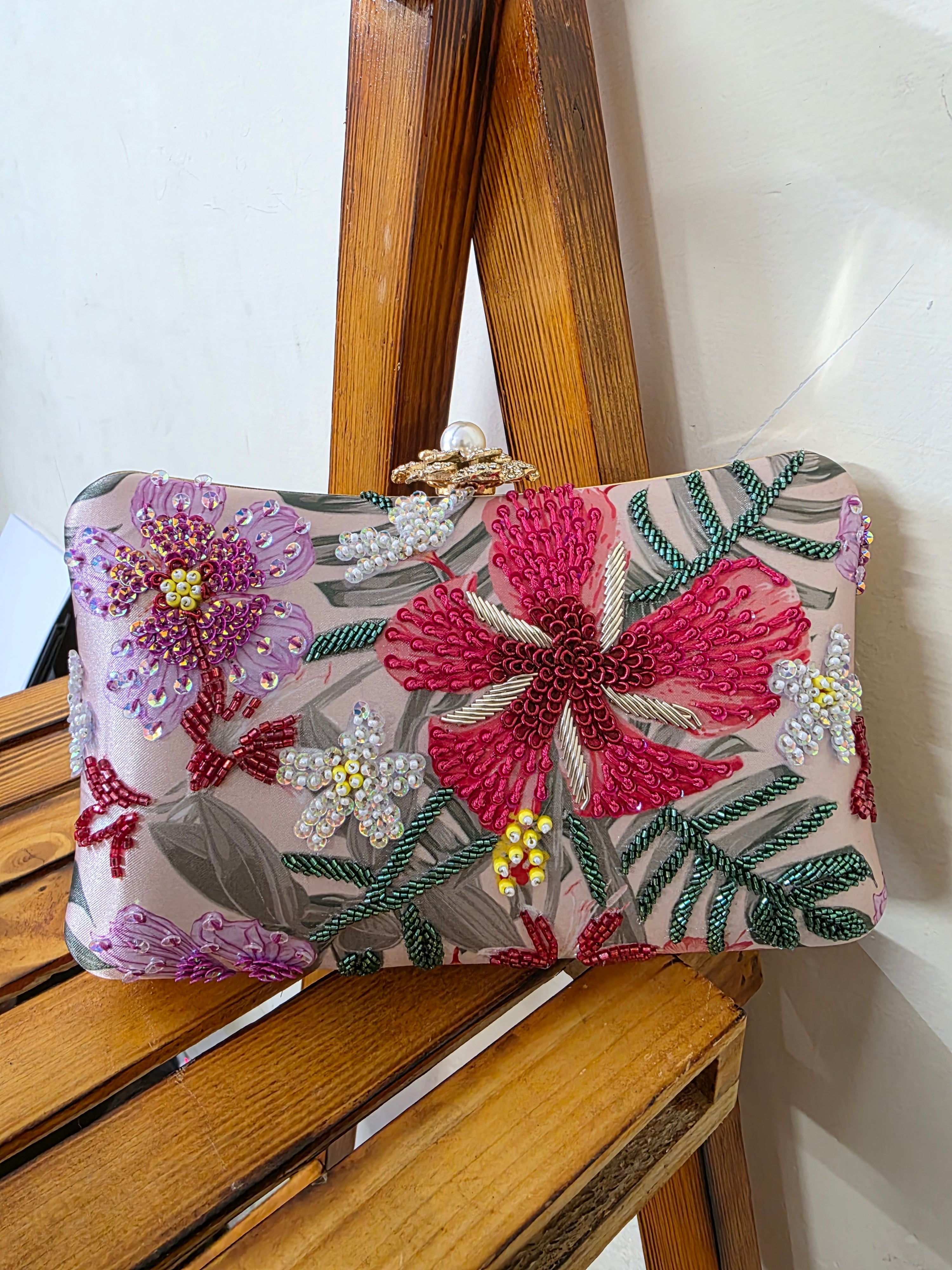 Printed embroidered clutch bag