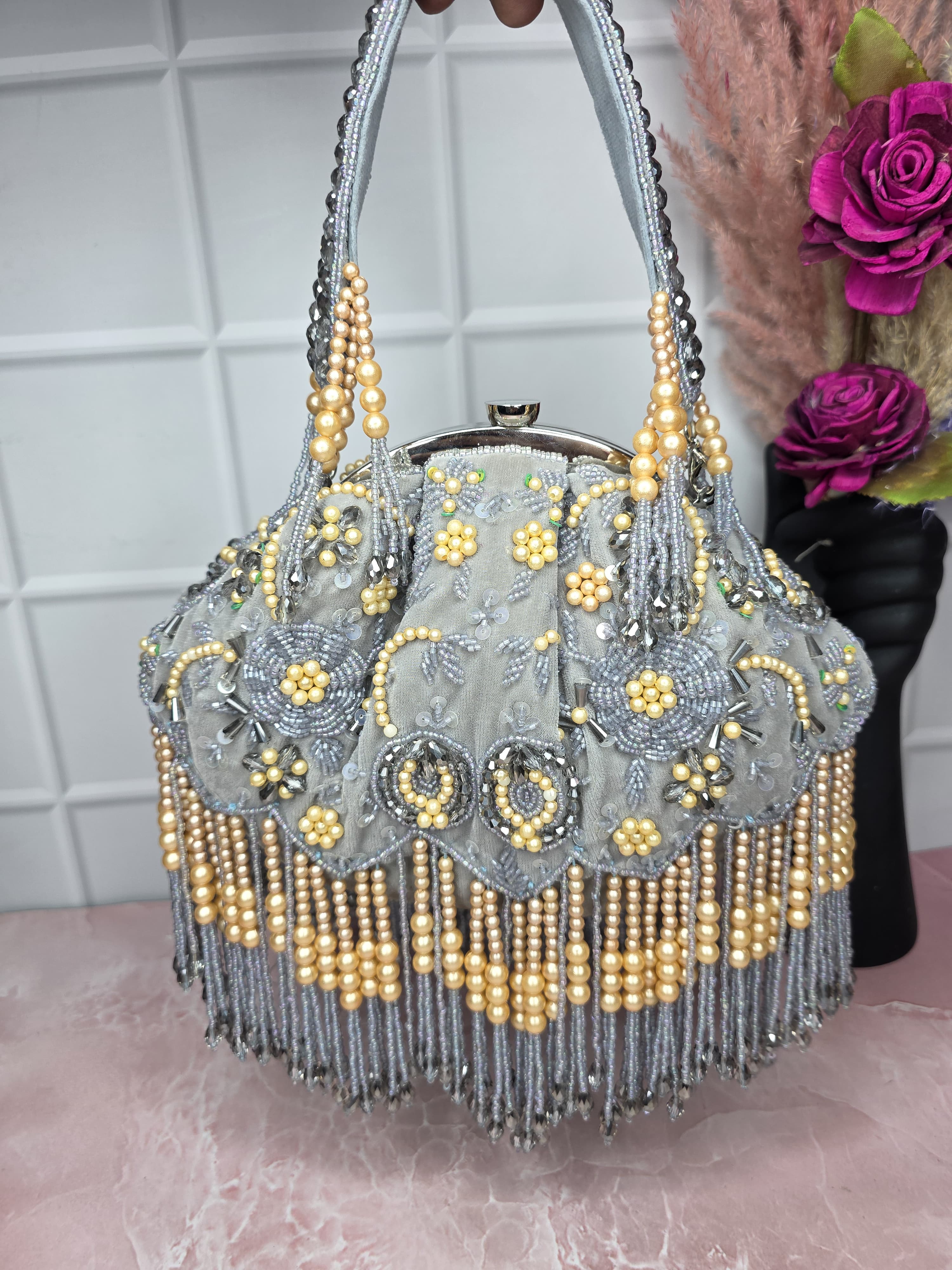 Grey embroidered batua bag