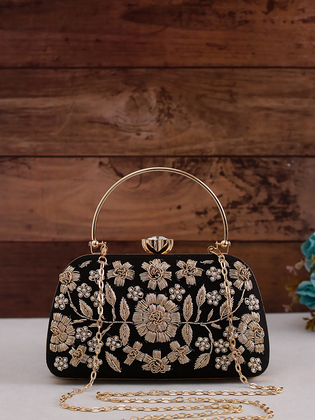 handmade black embroidered handle clutch bag