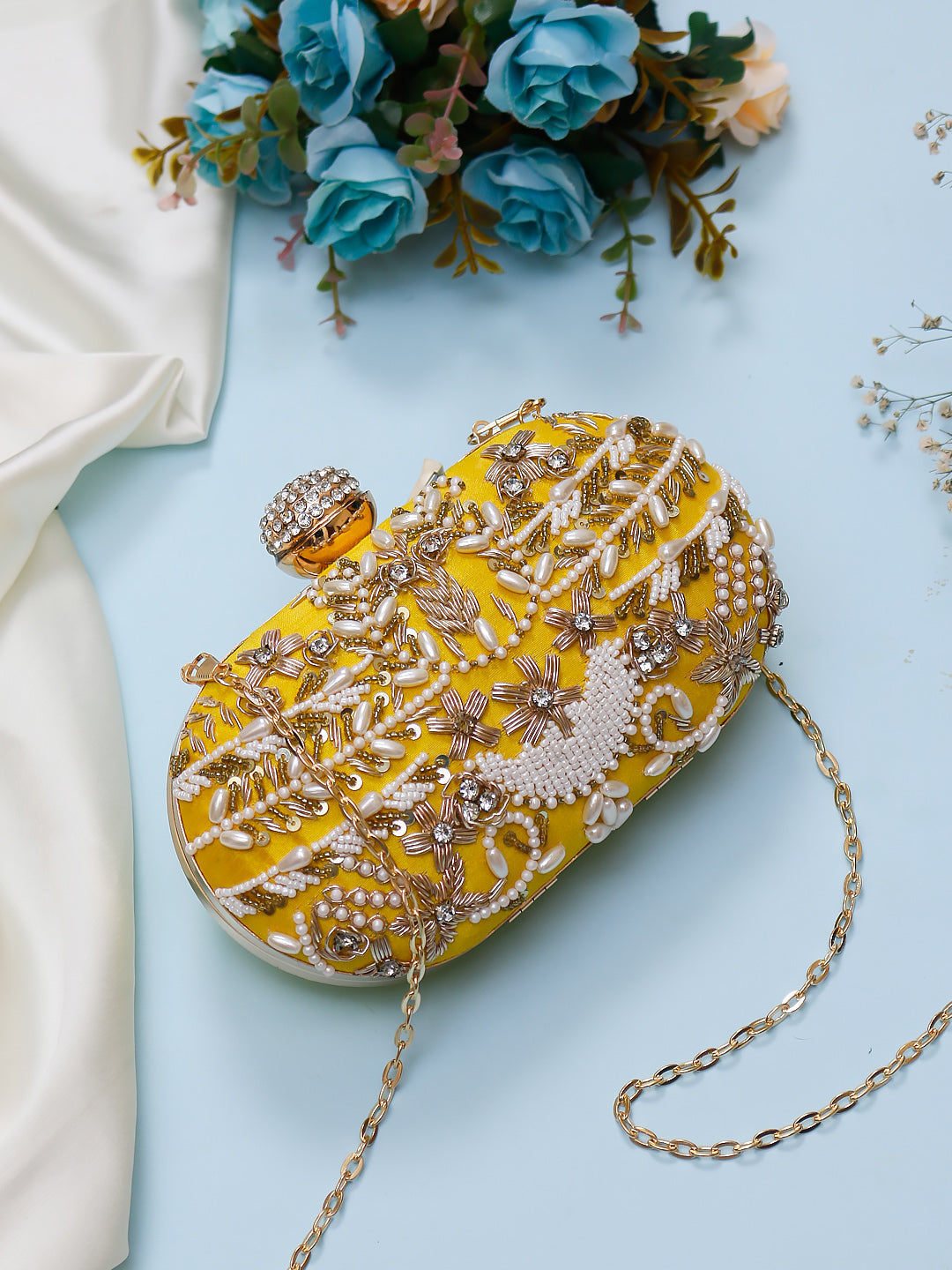 yellow oval clutch