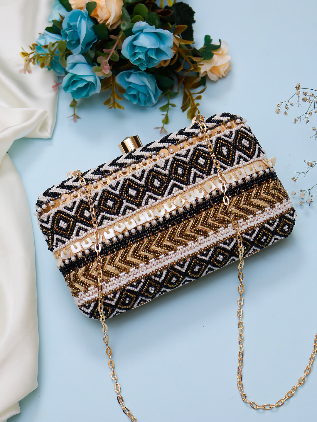 traditional black embellished clutch