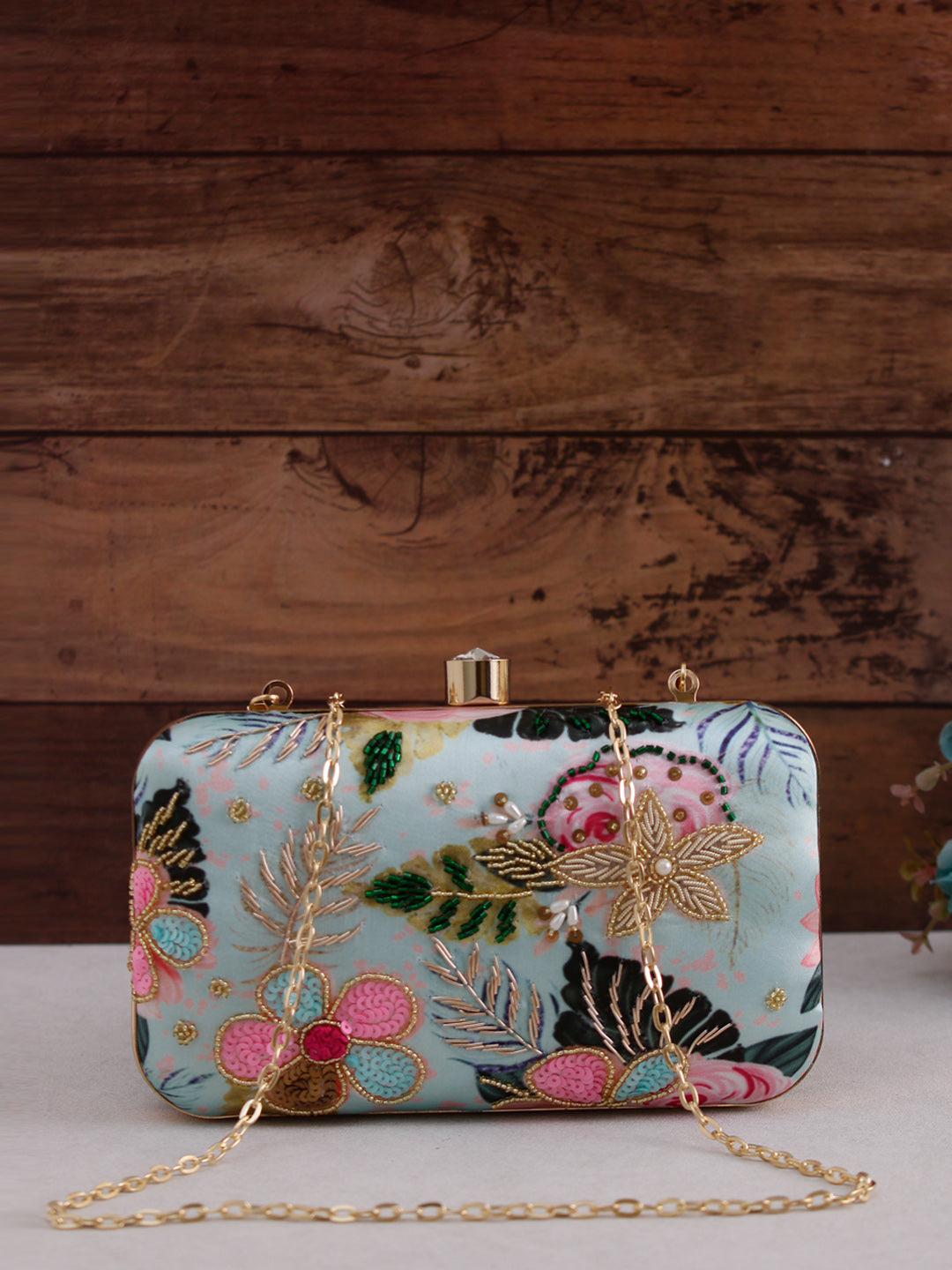 printed embroidery green clutch
