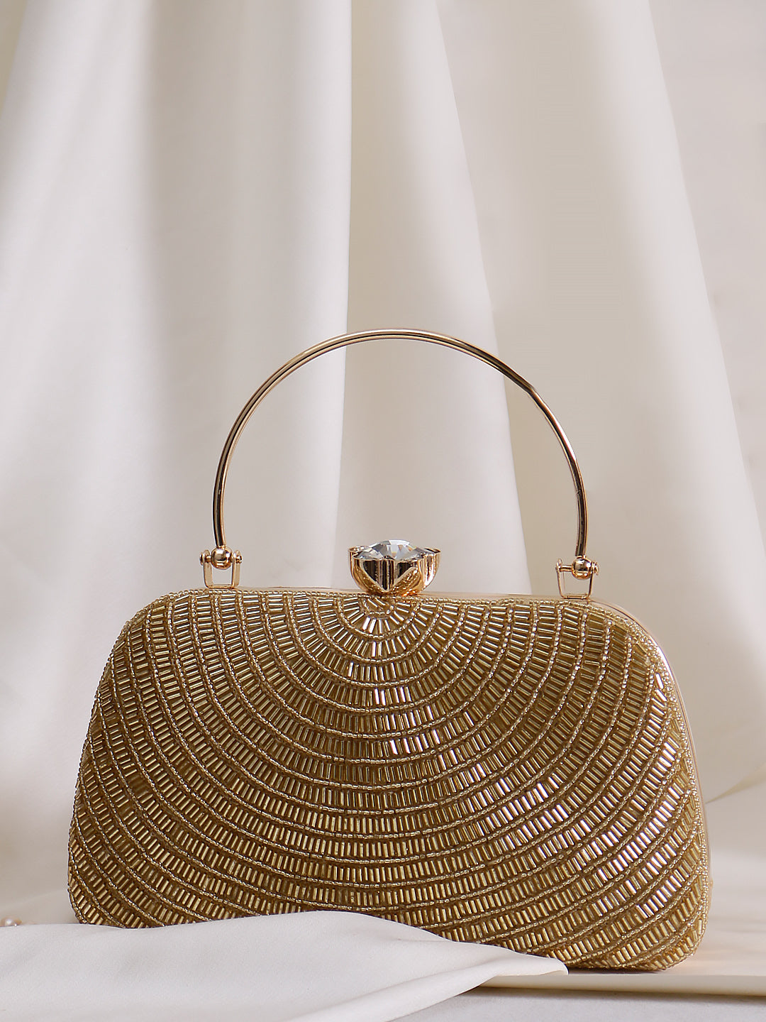gold handle style clutch