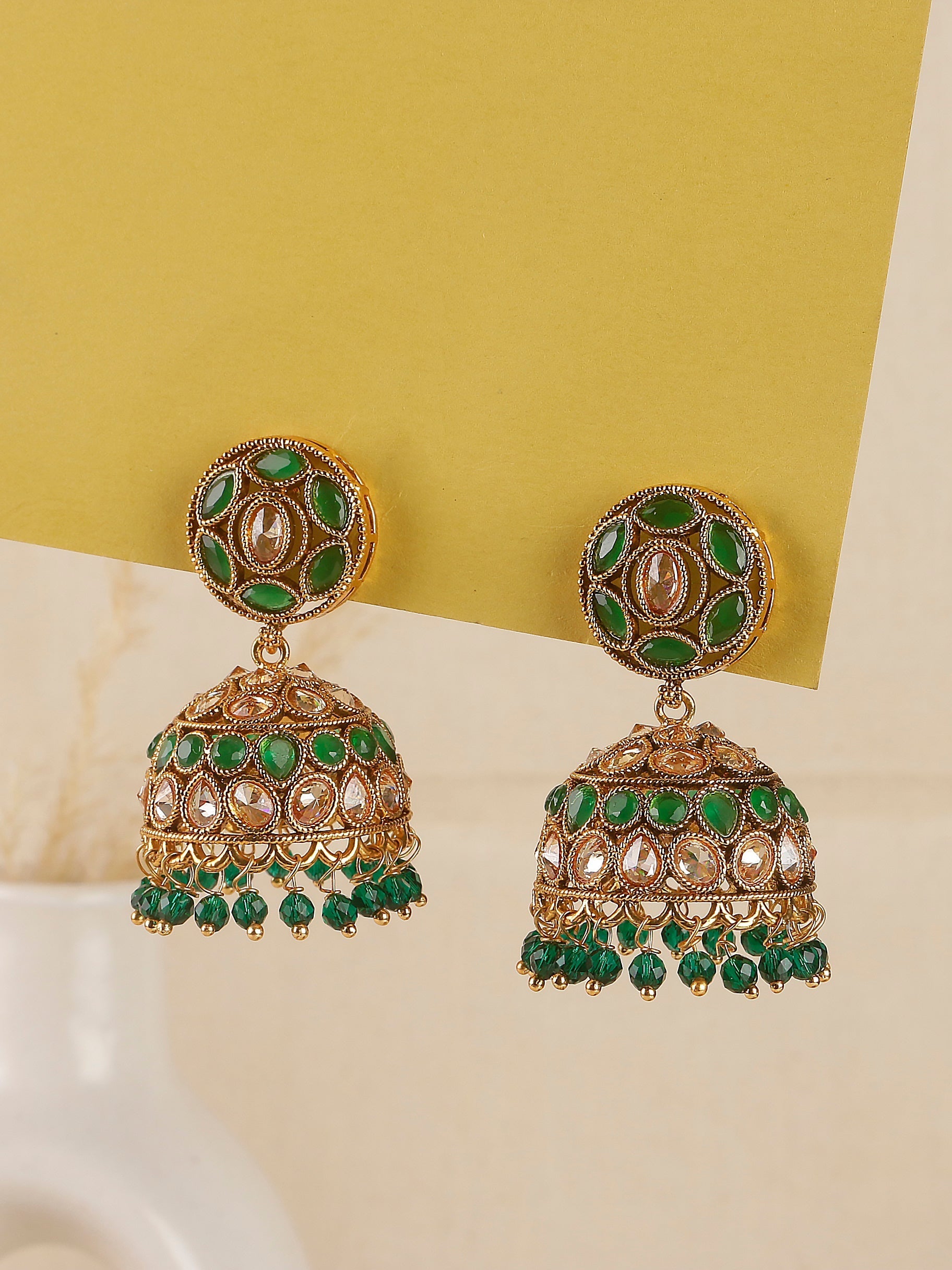 Swisni Alloy Golden Jhumki Earrings with Green beads